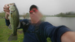 Largemouth Bass AJ Hauser in the Rain Strike King Ocho