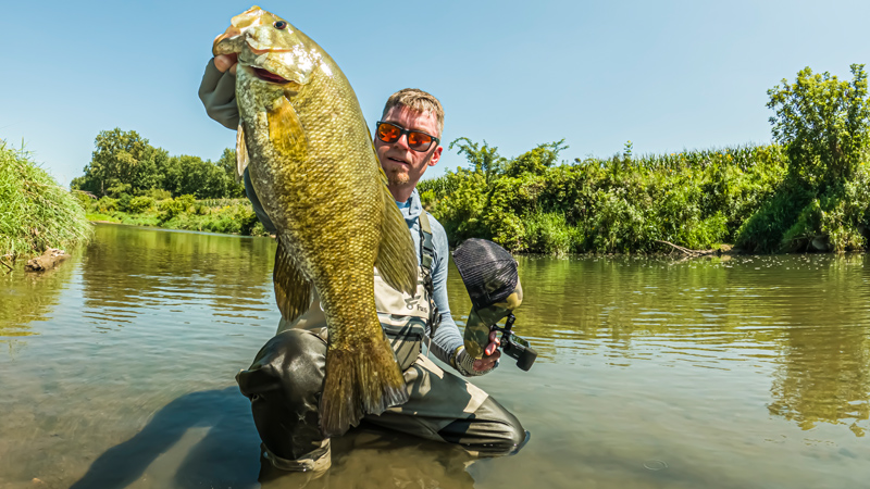 aj hauser minimalist fisherman smallmouth river bass strike king rage craw